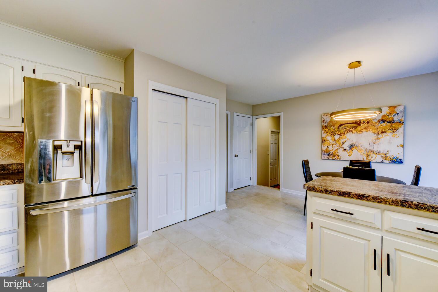 6 Coventry Circle Princeton Junction, NJ 08550 - Photo 18 of 70 a kitchen with stainless steel appliances granite countertop a refrigerator and a stove top oven