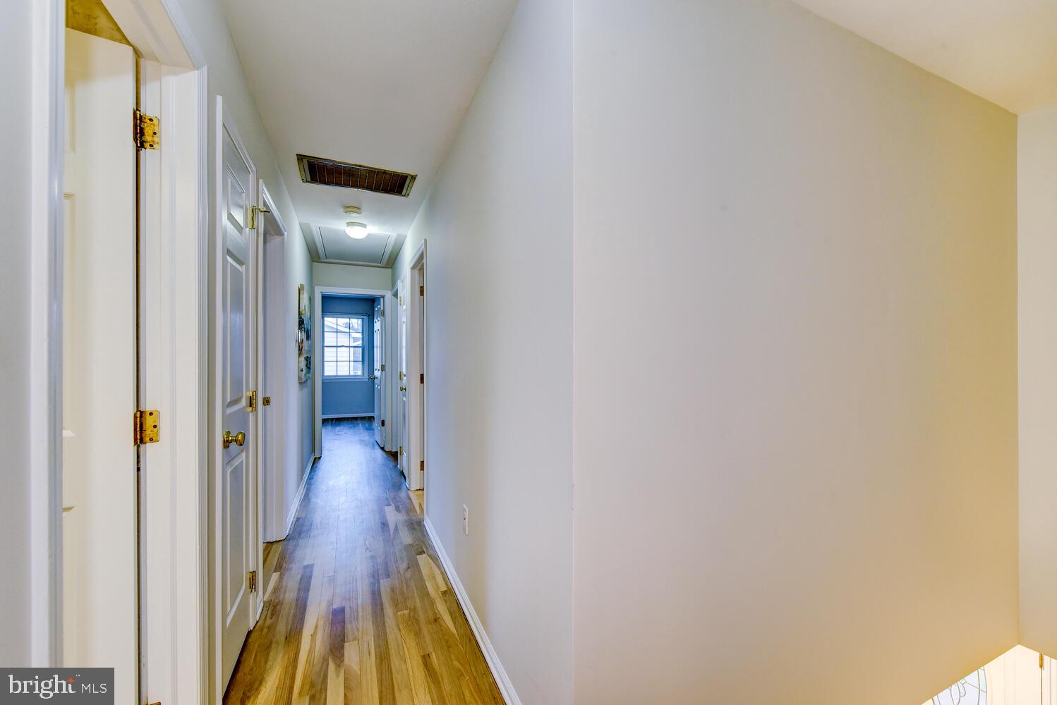 6 Coventry Circle Princeton Junction, NJ 08550 - Photo 35 of 70 a view of a hallway with wooden floor
