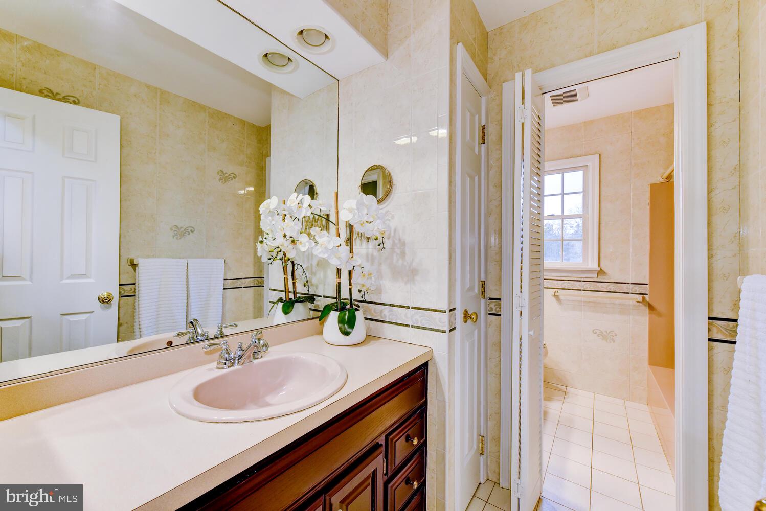 6 Coventry Circle Princeton Junction, NJ 08550 - Photo 41 of 70 a bathroom with a sink and a mirror