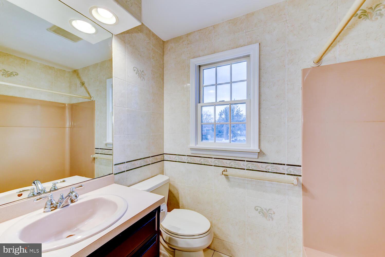 6 Coventry Circle Princeton Junction, NJ 08550 - Photo 42 of 70 a bathroom with a sink vanity mirror and toilet