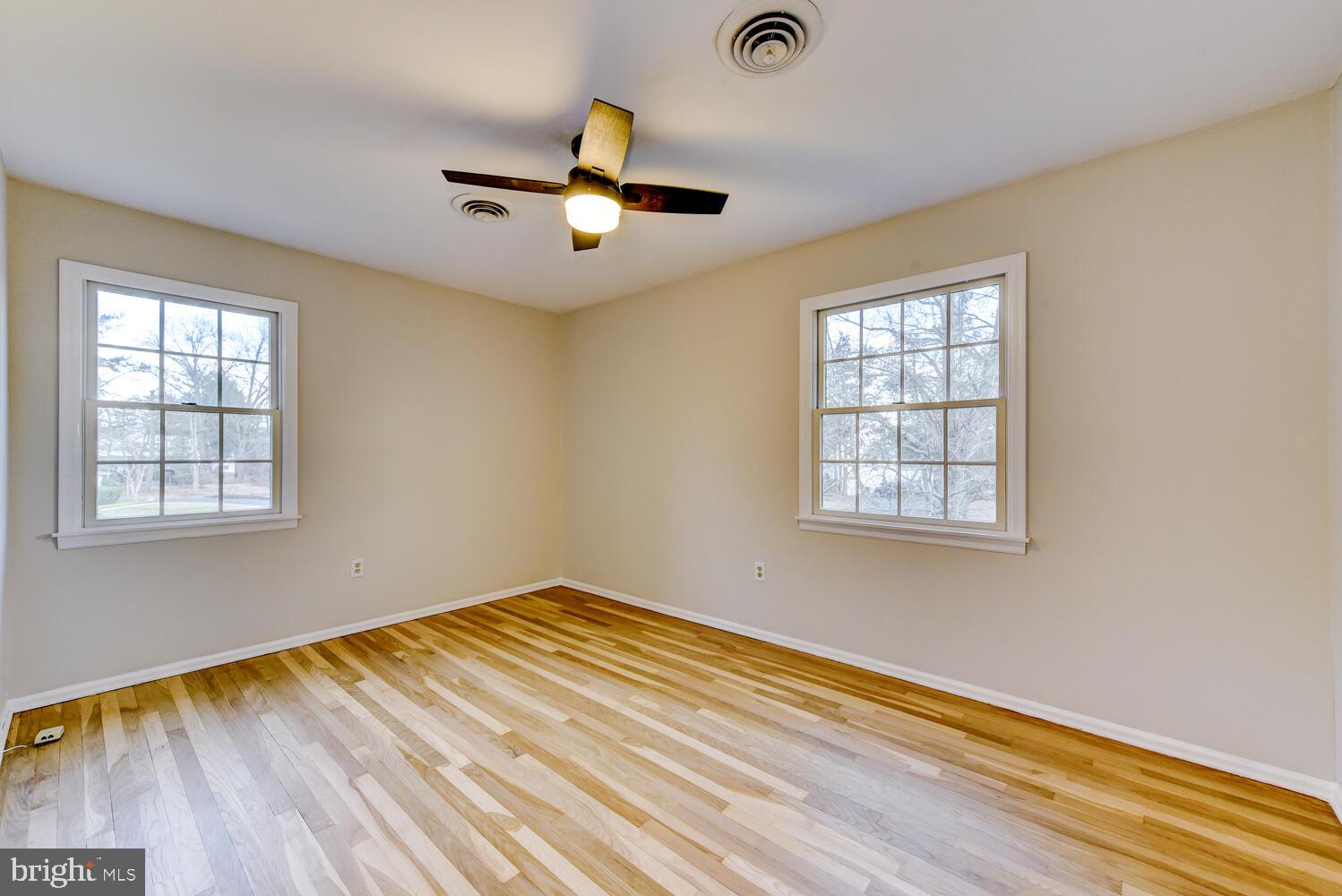 6 Coventry Circle Princeton Junction, NJ 08550 - Photo 43 of 70 a view of empty room with wooden floor and fan