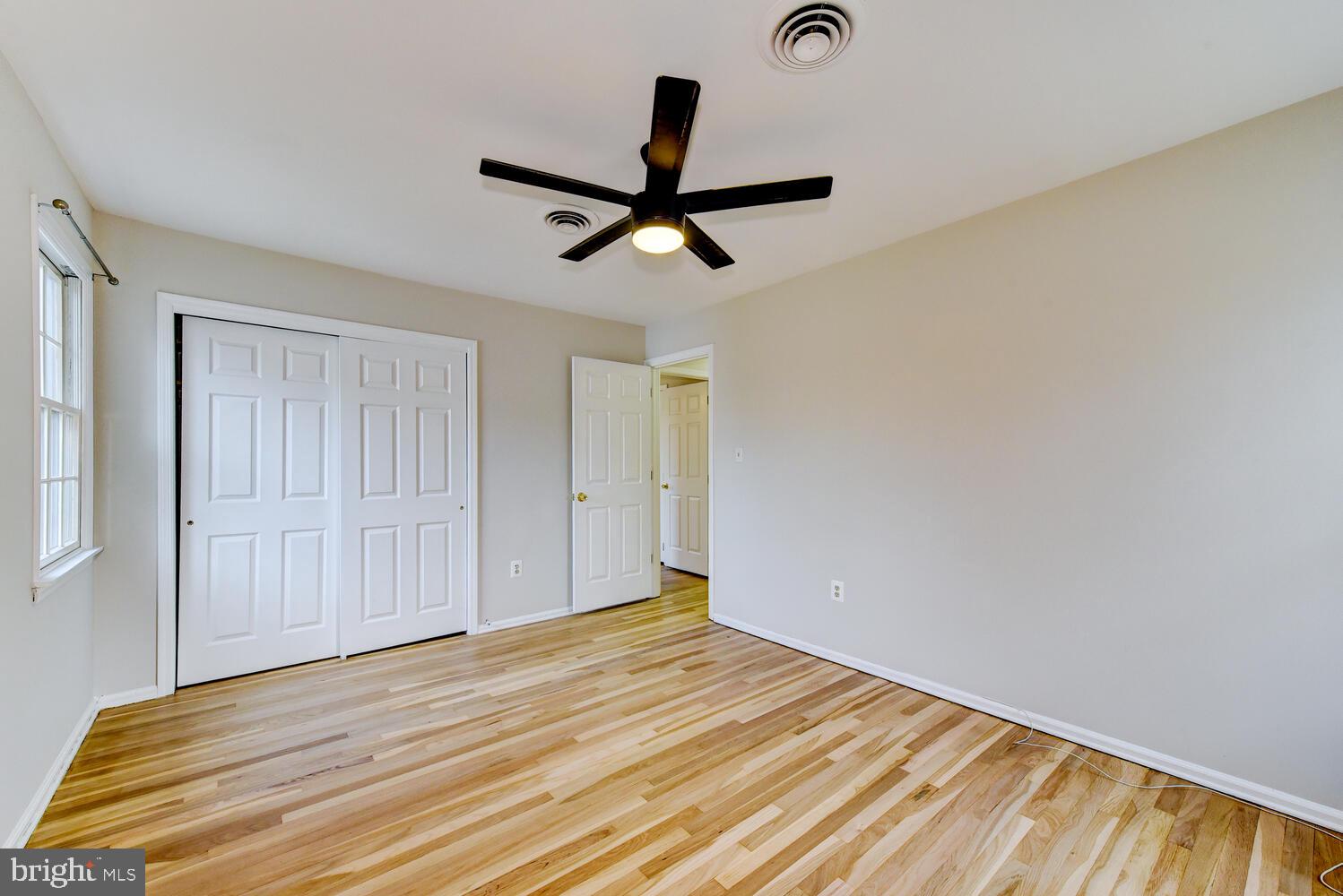 6 Coventry Circle Princeton Junction, NJ 08550 - Photo 46 of 70 a view of empty room with wooden floor