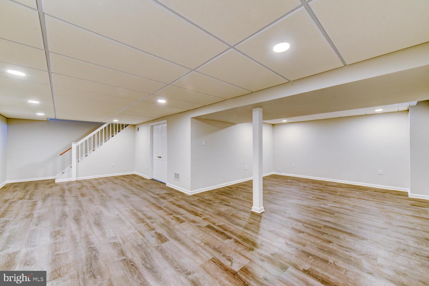 6 Coventry Circle Princeton Junction, NJ 08550 - Photo 47 of 70 a view of an empty room with wooden floor