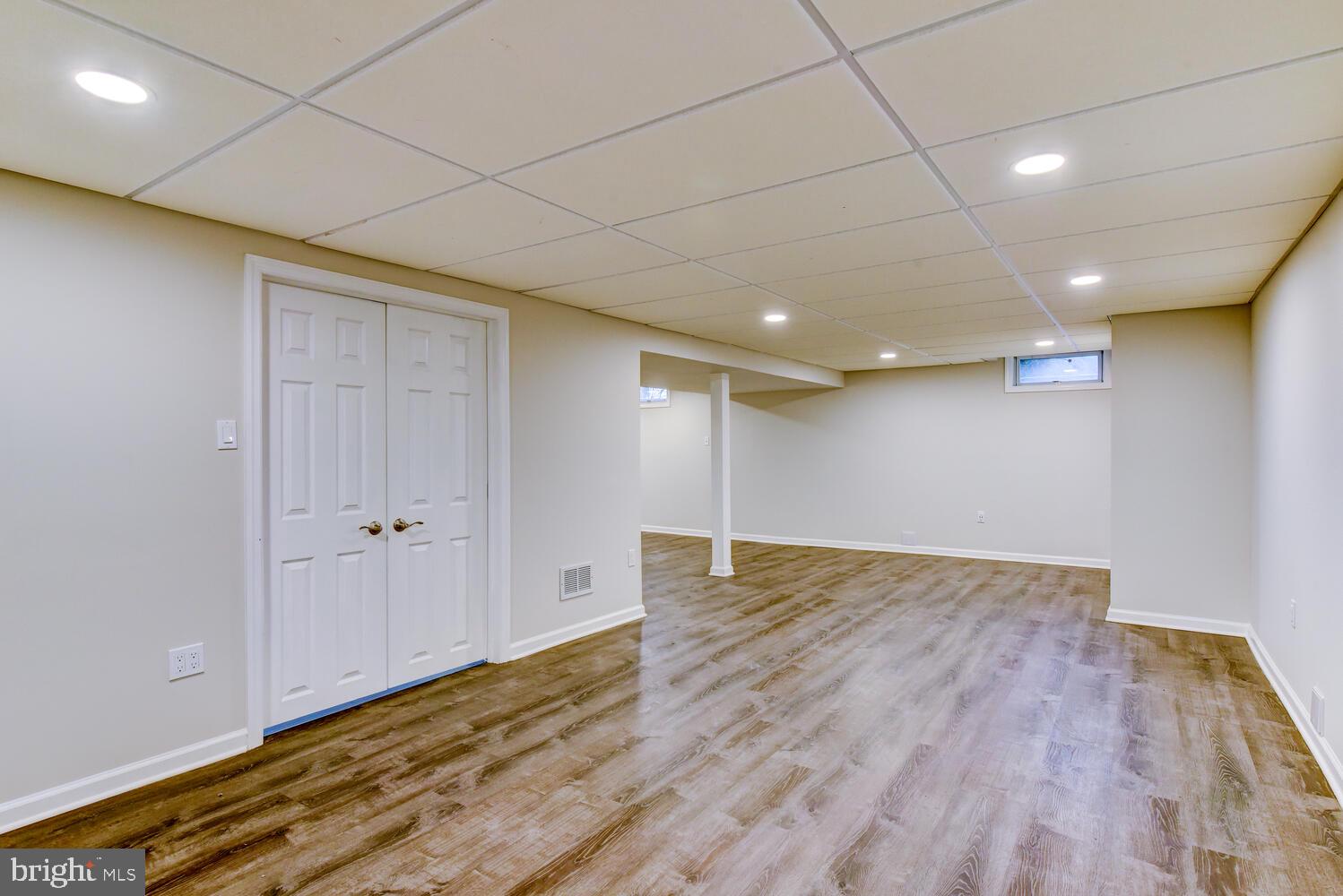 6 Coventry Circle Princeton Junction, NJ 08550 - Photo 48 of 70 a view of an empty room with wooden floor