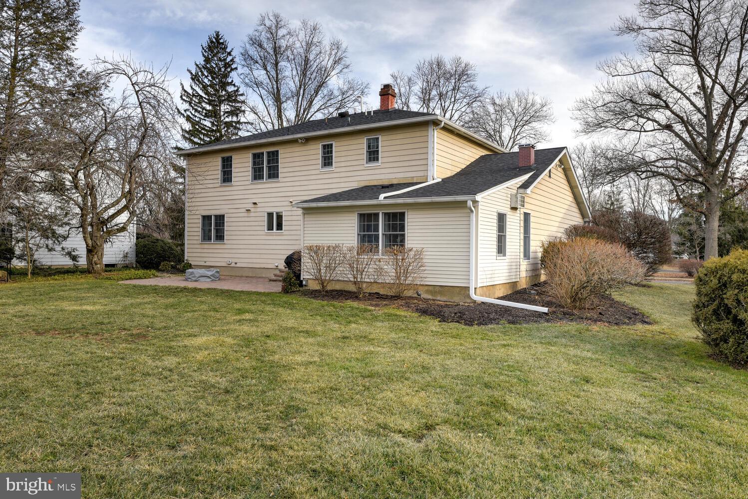 6 Coventry Circle Princeton Junction, NJ 08550 - Photo 60 of 70 a view of a white house with a big yard