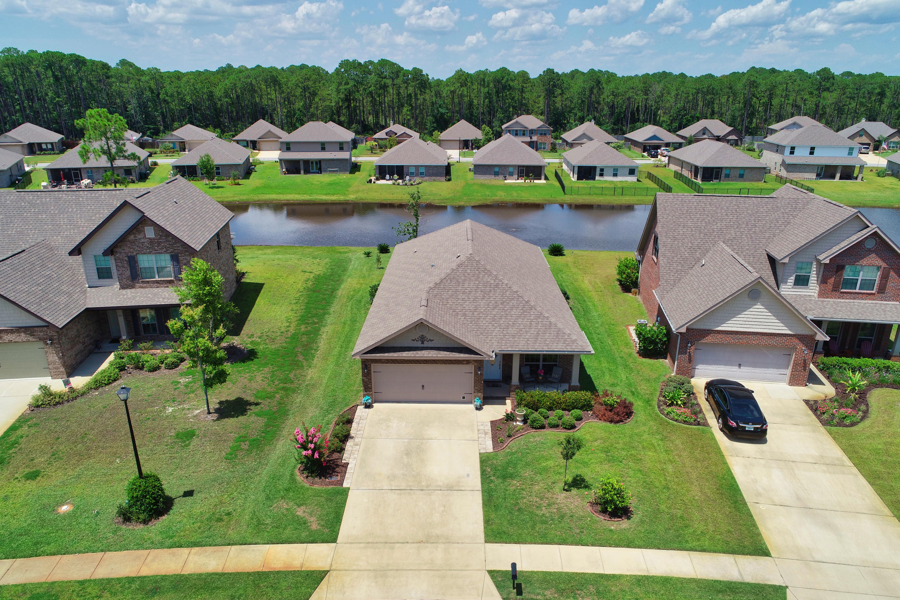 134 Pin Oak Loop Santa Rosa Beach, FL 32459 - Photo 46 of 51 an aerial view of multiple houses with yard