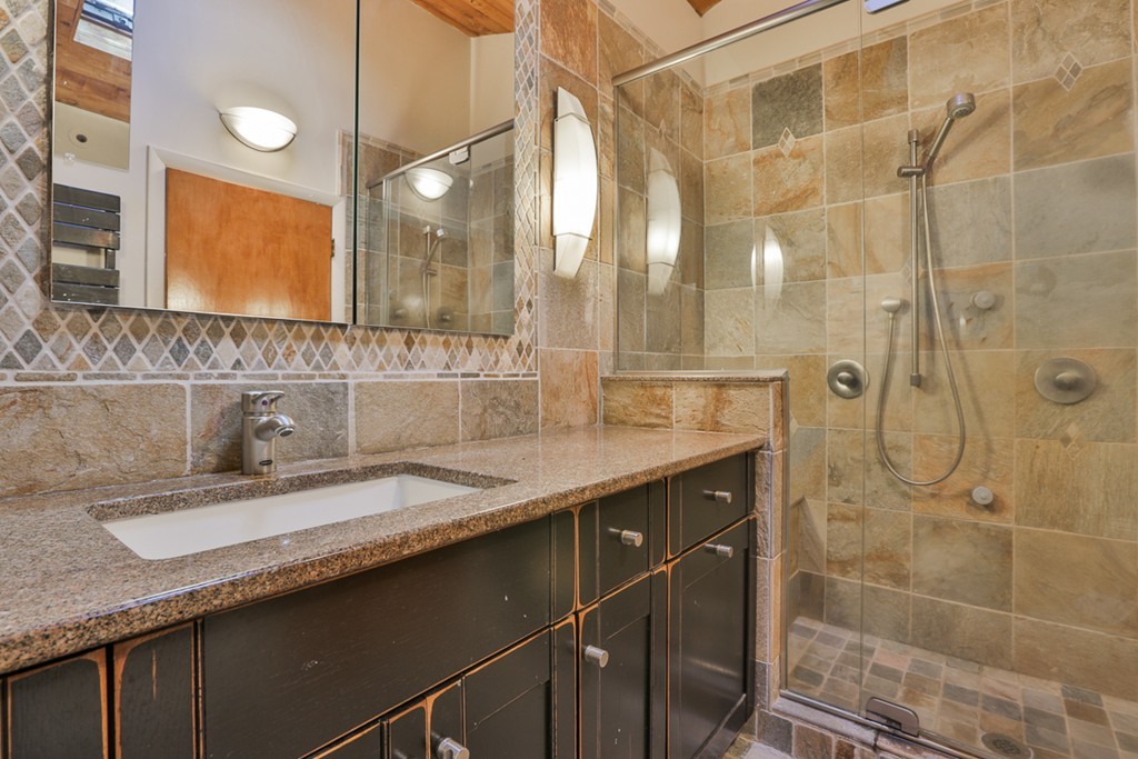 119 Pinnacle Road Harvard, MA 01451 - Photo 13 of 30 a bathroom with a granite countertop sink a mirror and a shower