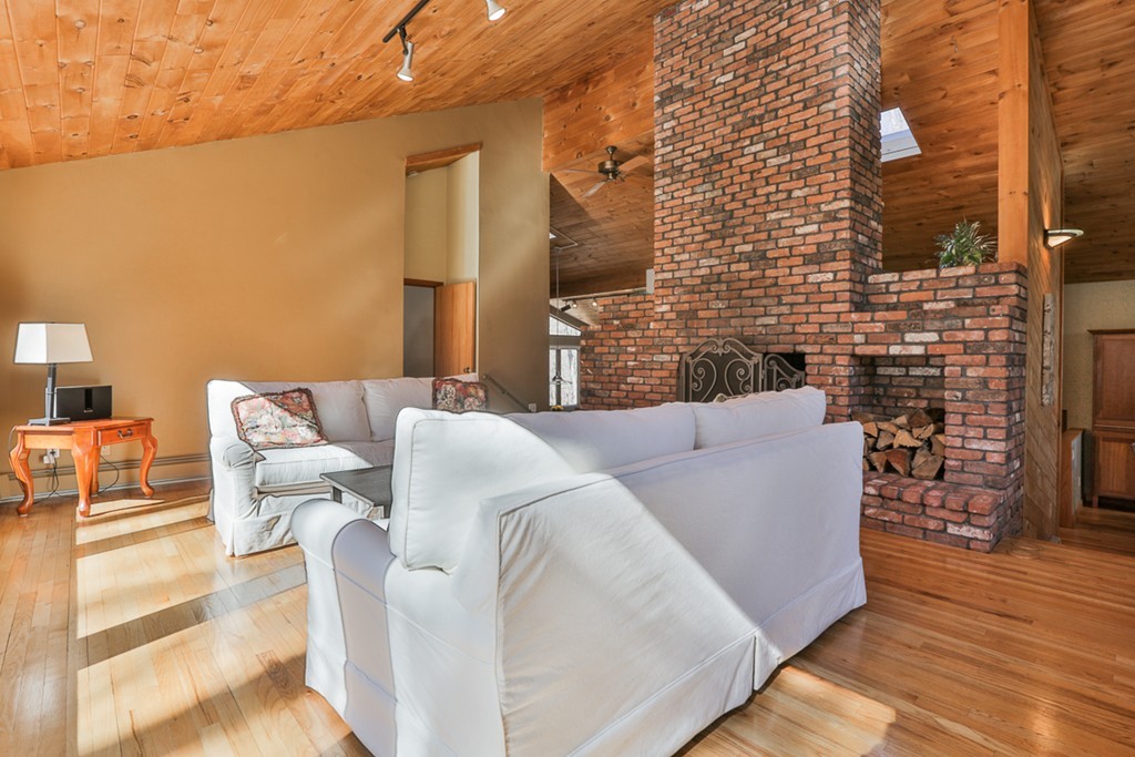 119 Pinnacle Road Harvard, MA 01451 - Photo 16 of 30 a balcony with couch and wooden floor