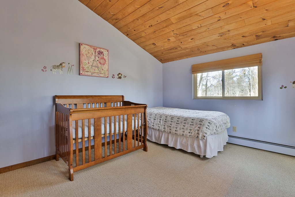 119 Pinnacle Road Harvard, MA 01451 - Photo 20 of 30 a bedroom with a bed and a window