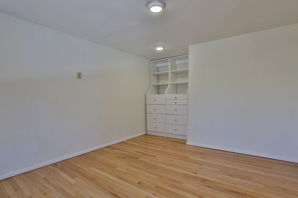 119 Pinnacle Road Harvard, MA 01451 - Photo 26 of 30 wooden floor and cabinet in a room
