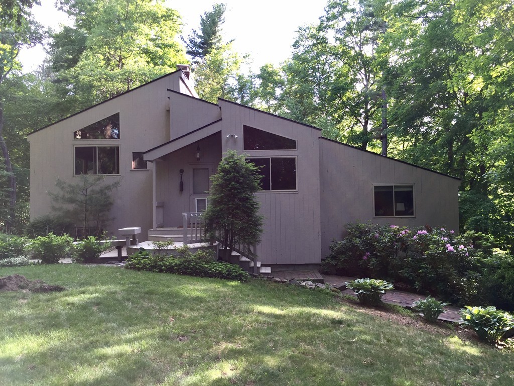 119 Pinnacle Road Harvard, MA 01451 - Photo 30 of 30 a backyard of a house with lots of green space