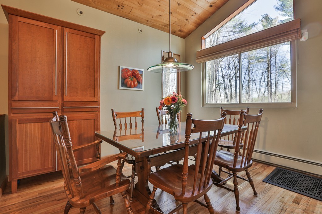 119 Pinnacle Road Harvard, MA 01451 - Photo 3 of 30 a view of a dining room with furniture window and wooden floor