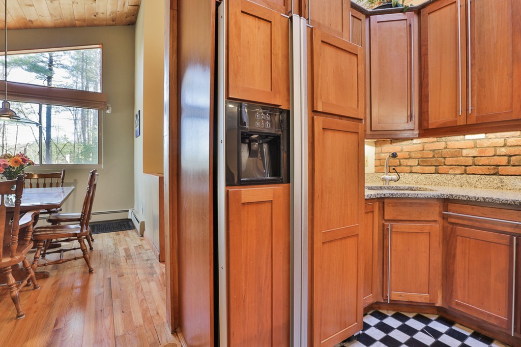 119 Pinnacle Road Harvard, MA 01451 - Photo 4 of 30 a kitchen with stainless steel appliances granite countertop a refrigerator and a sink