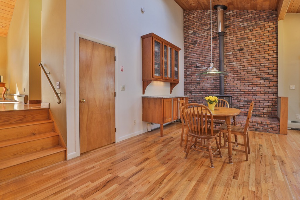 119 Pinnacle Road Harvard, MA 01451 - Photo 7 of 30 a view of a patio with table and chairs