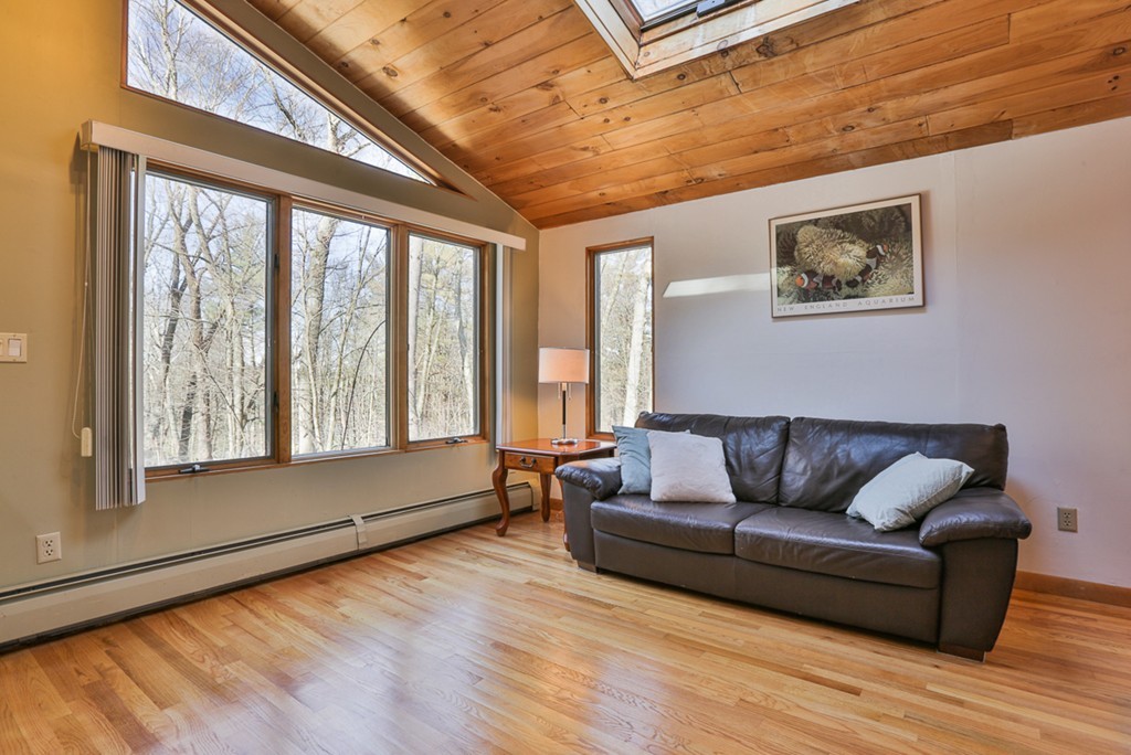 119 Pinnacle Road Harvard, MA 01451 - Photo 10 of 30 a living room with furniture and a large window