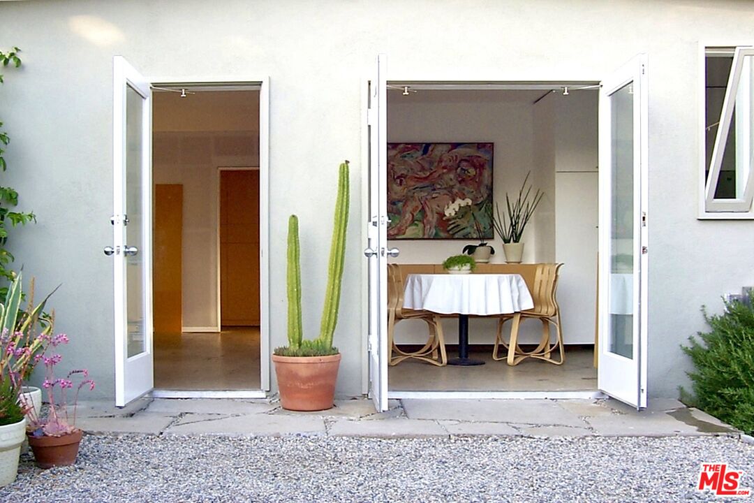 1819 Euclid Street Santa Monica, CA 90404 - Photo 12 of 55 a view of living room filled with furniture and a potted plant