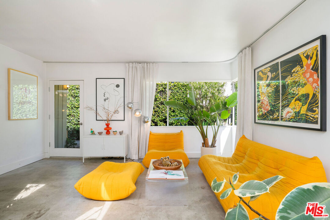 1819 Euclid Street Santa Monica, CA 90404 - Photo 17 of 55 a bed room with a bed and a couch