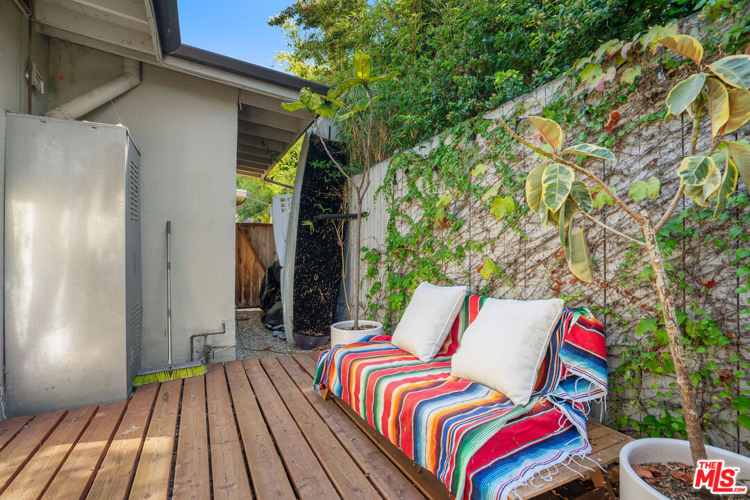 1819 Euclid Street Santa Monica, CA 90404 - Photo 27 of 55 a view of balcony with wooden floor and outdoor seating