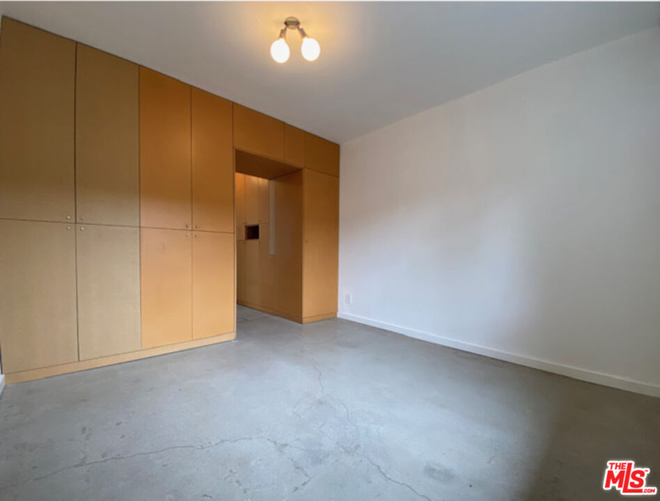 1819 Euclid Street Santa Monica, CA 90404 - Photo 10 of 55 an empty room with a natural light