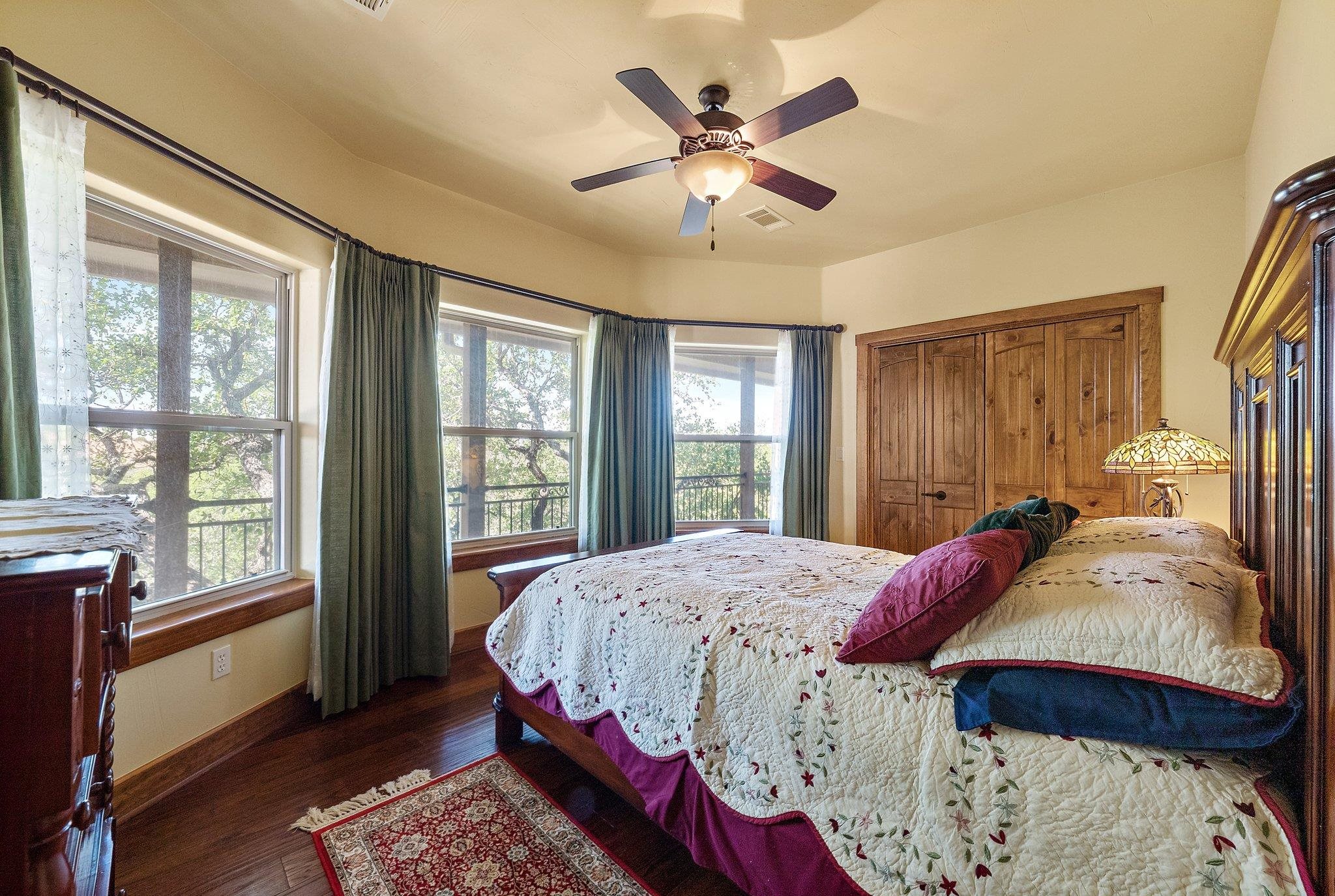 304 Hi Ridge Road Horseshoe Bay, TX 78657 - Photo 25 of 30 a bed room with a bed and a window