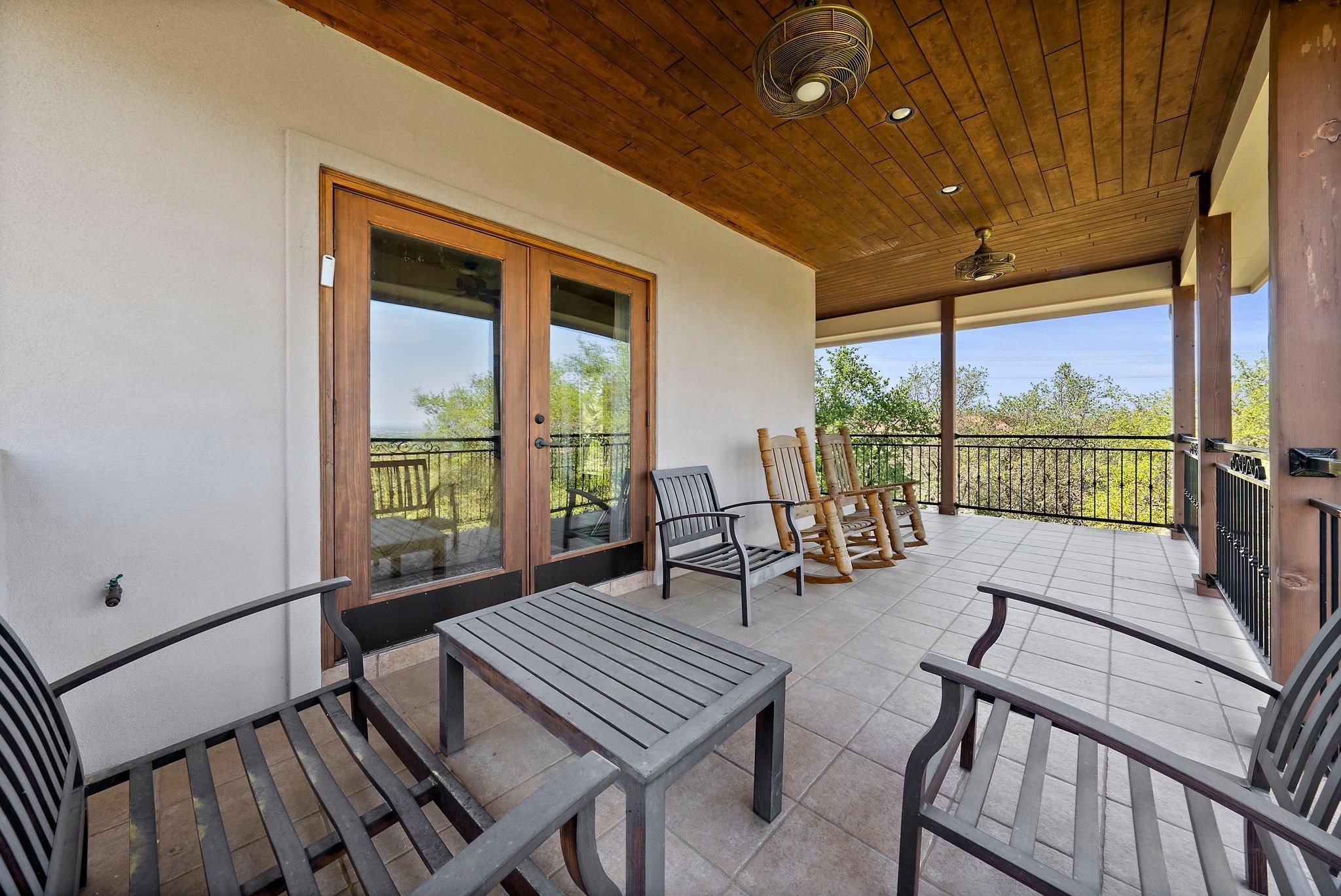 304 Hi Ridge Road Horseshoe Bay, TX 78657 - Photo 30 of 30 a view of a patio with wooden floor and outdoor seating