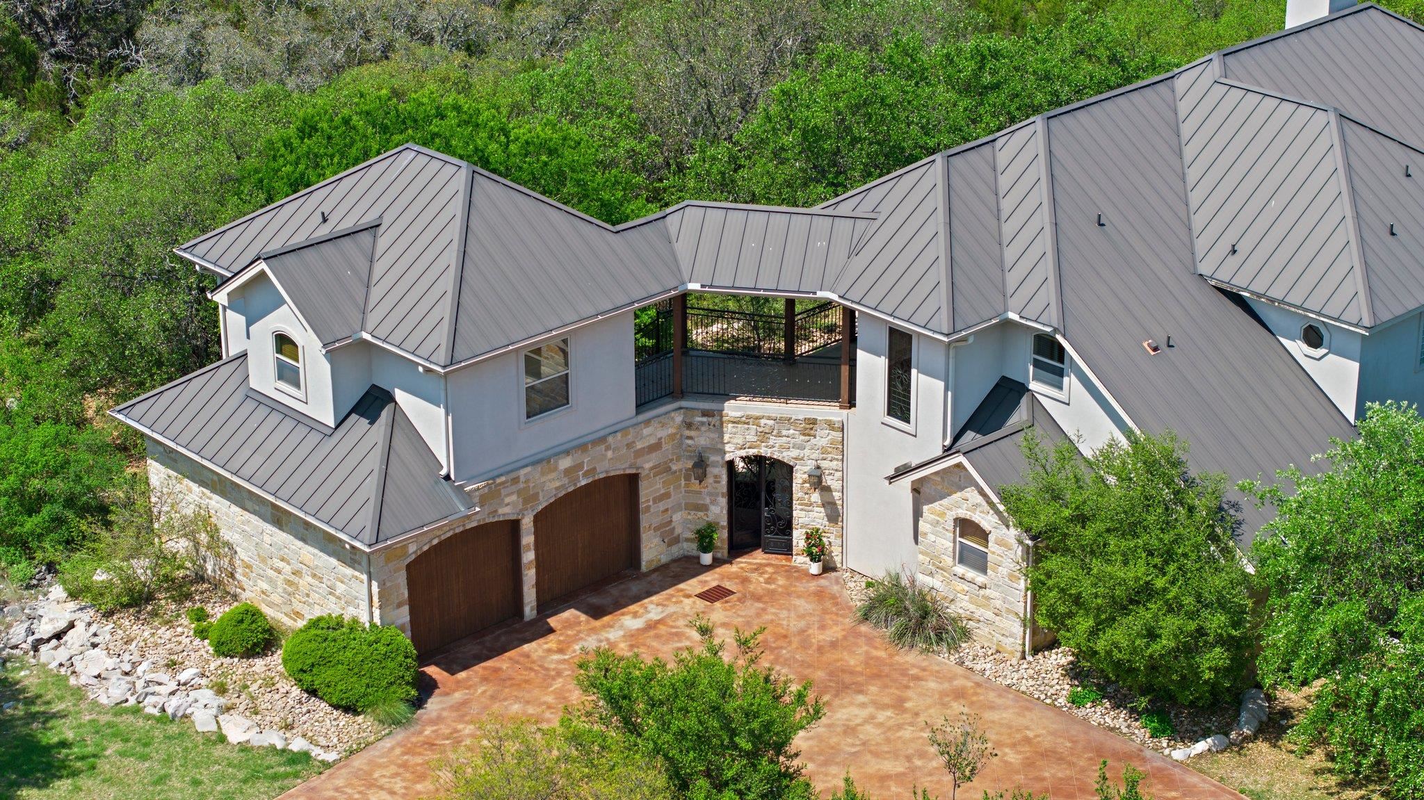 304 Hi Ridge Road Horseshoe Bay, TX 78657 - Photo 3 of 30 a aerial view of a house with a yard