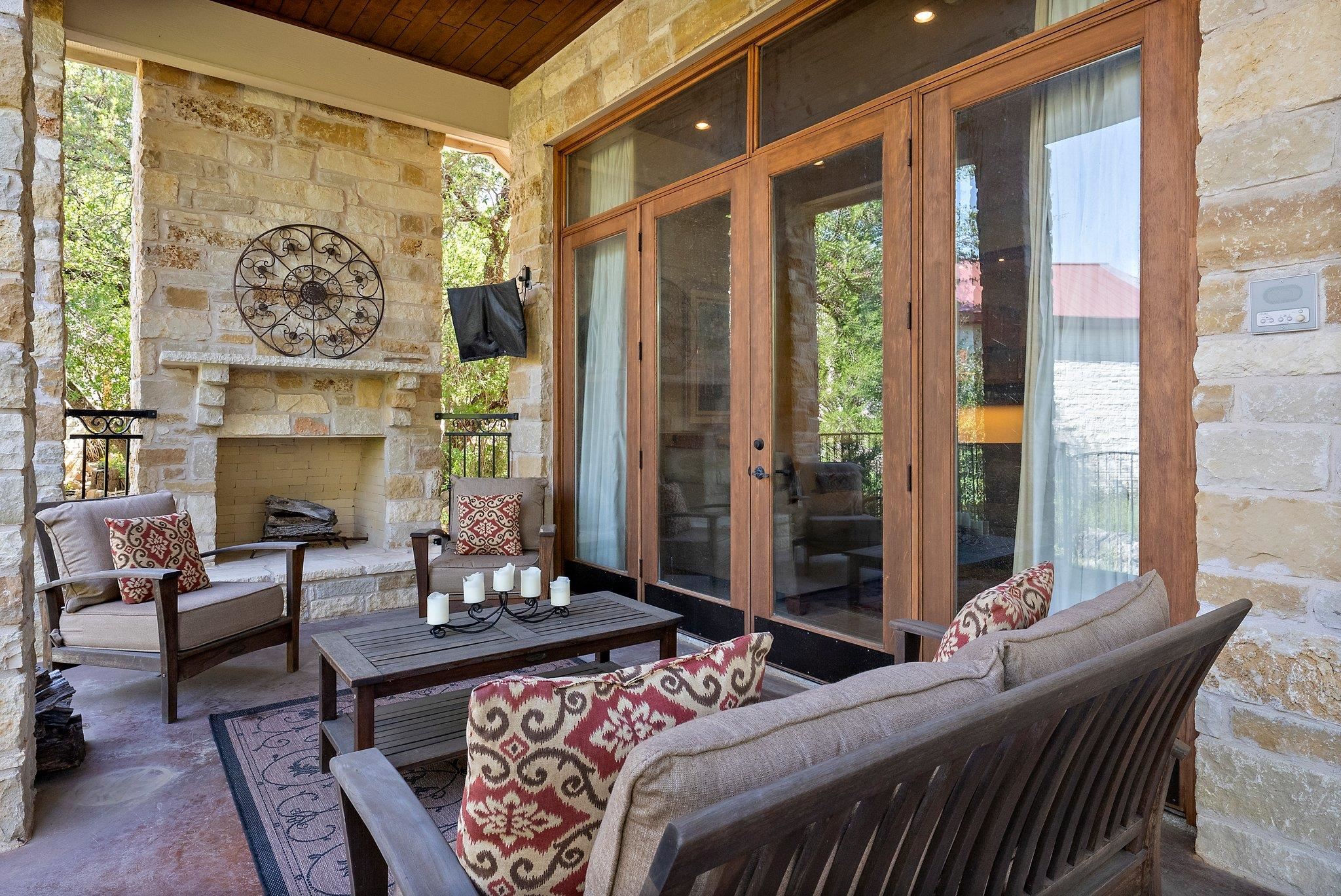 304 Hi Ridge Road Horseshoe Bay, TX 78657 - Photo 10 of 30 a bedroom with a bed and a large window with table lamp