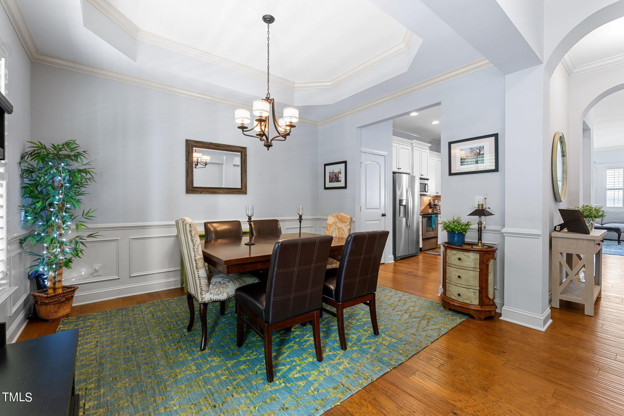844 Historian Street Raleigh, NC 27603 - Photo 7 of 25 a view of a dining room with furniture window and wooden floor