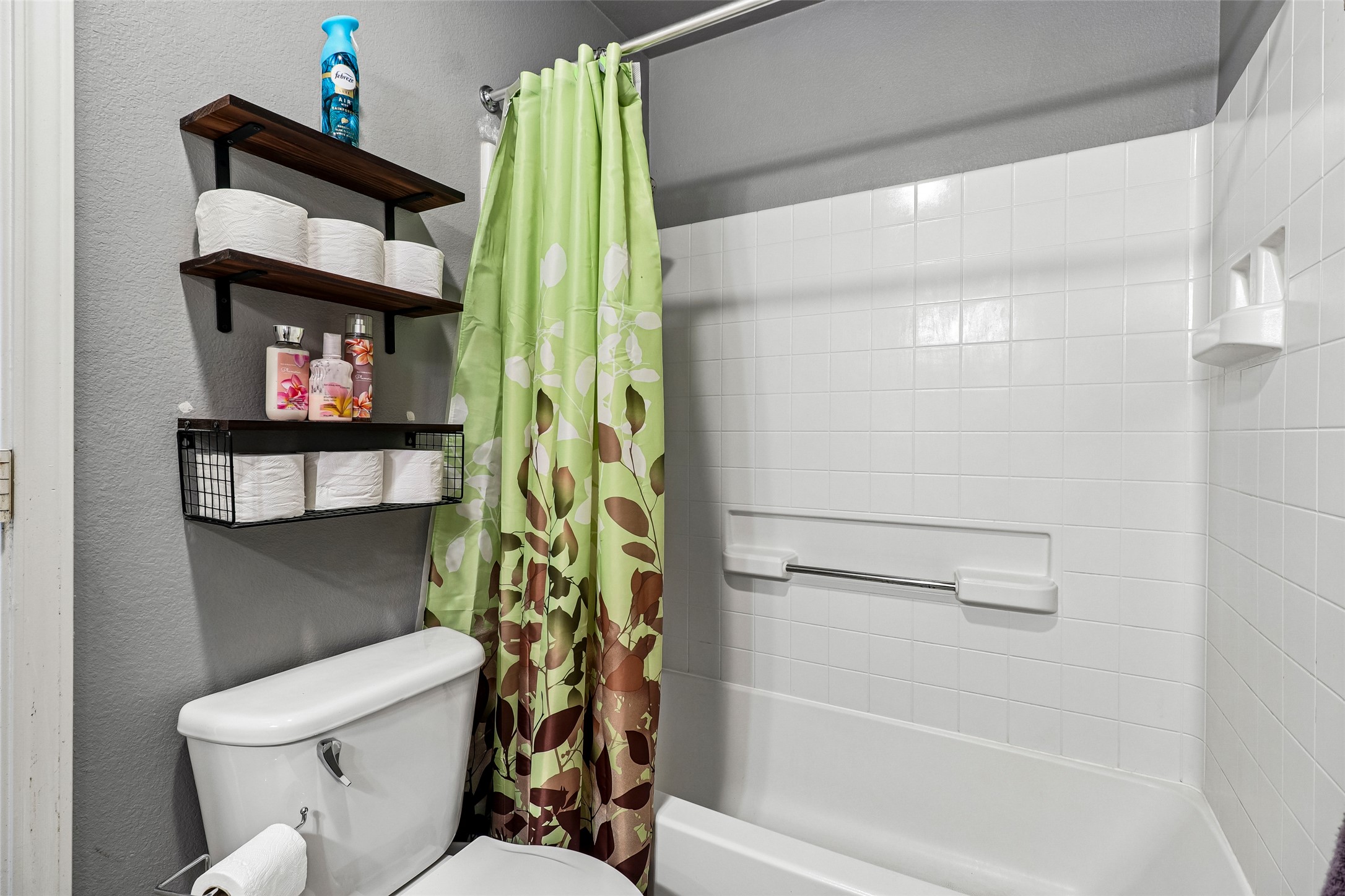 311 A Utterback Kyle, TX 78640 - Photo 20 of 40 a bathroom with a toilet and a shower