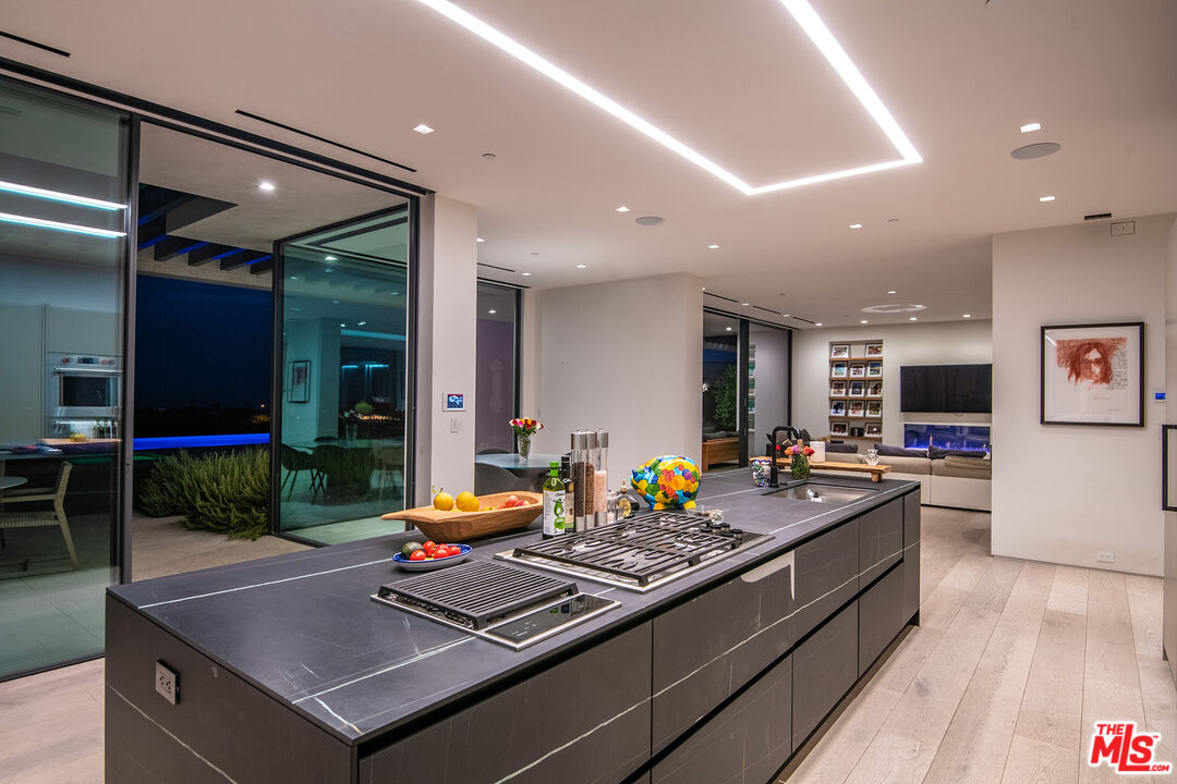 23919 Malibu Road Malibu, CA 90265 - Photo 31 of 33 a living room with furniture pool table and flat screen tv