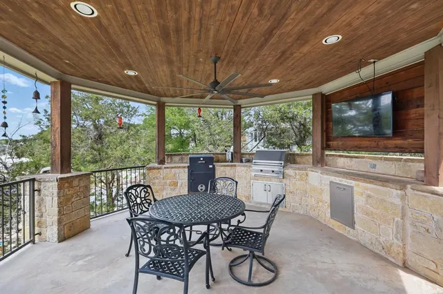 a dining room with furniture window and outside view