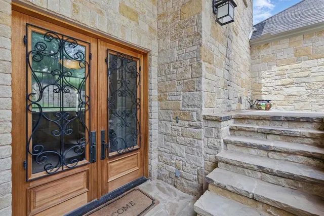 a view of a hallway with windows