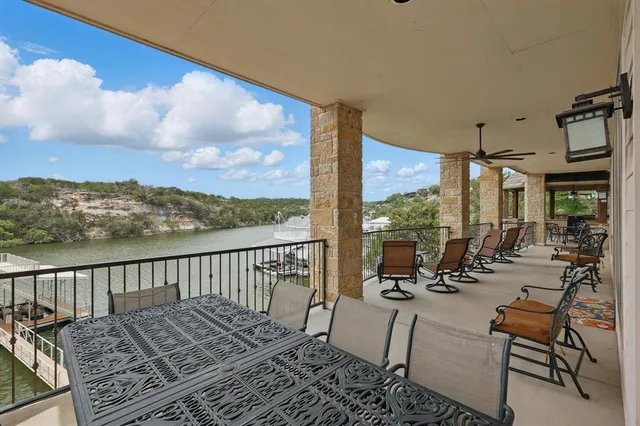 a view of a garage with a lot of stuff and furniture