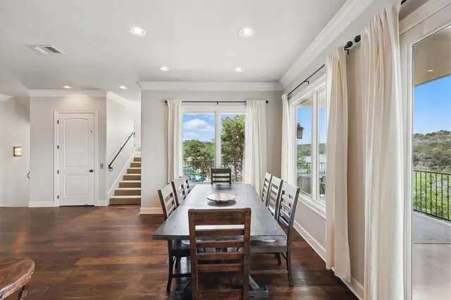 a view of a chairs and table in patio with a couch