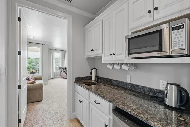 a bedroom with bed and window
