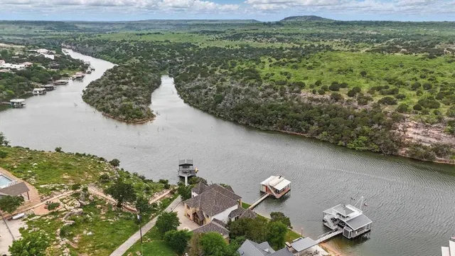 a view of a chair and table on the balcony