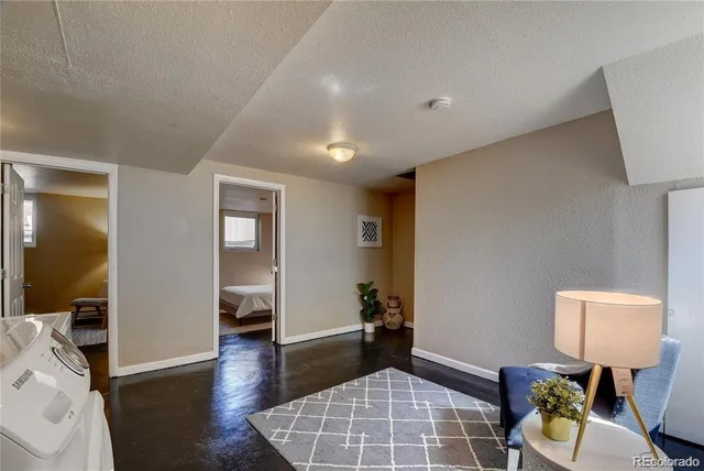a view of an entryway of house and wooden floor