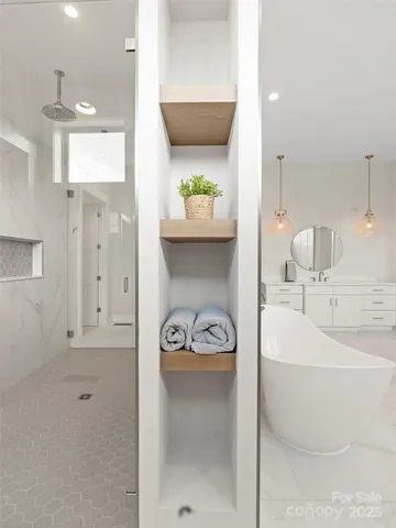 a bathroom with a bathtub and a sink