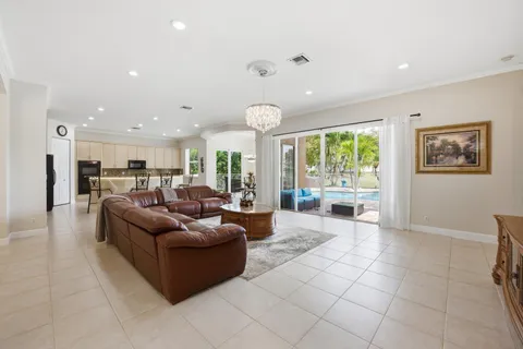 a spacious bedroom with a bed and a couch