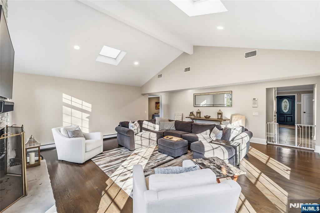 27 Pine Hill Road Old Tappan, NJ 07675 - Photo 17 of 50 a living room with furniture and a large window