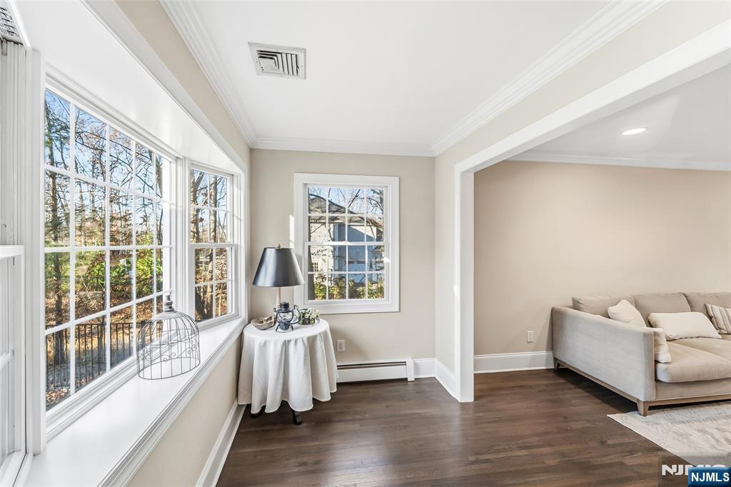 27 Pine Hill Road Old Tappan, NJ 07675 - Photo 21 of 50 a living room with furniture and large windows