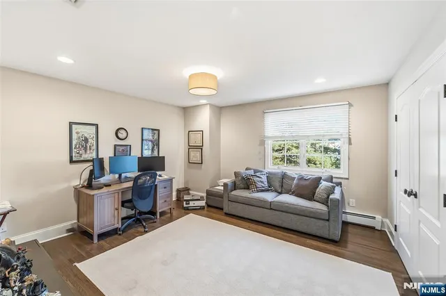 a bathroom with a granite countertop sink mirror and double