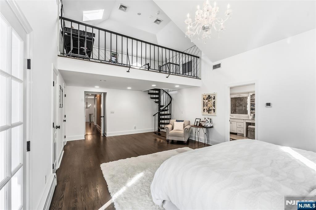 27 Pine Hill Road Old Tappan, NJ 07675 - Photo 30 of 50 a bedroom with a bed and a large window