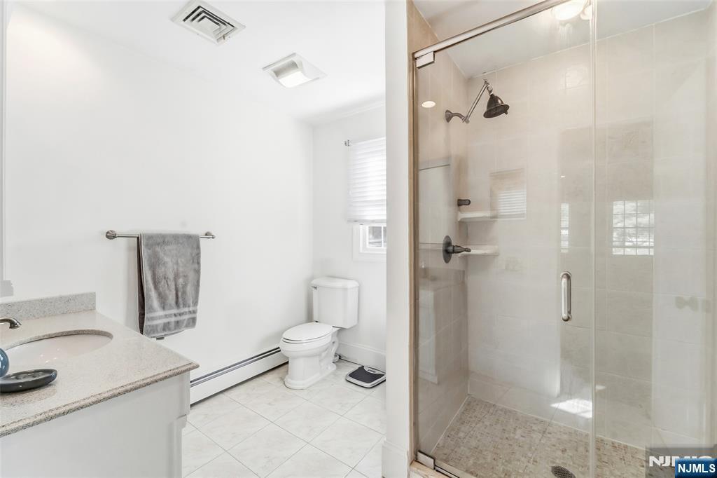 27 Pine Hill Road Old Tappan, NJ 07675 - Photo 40 of 50 a bathroom with a shower