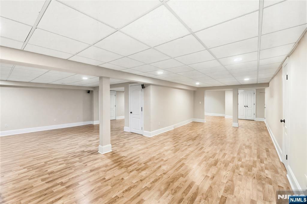27 Pine Hill Road Old Tappan, NJ 07675 - Photo 45 of 50 a view of empty room with wooden floor