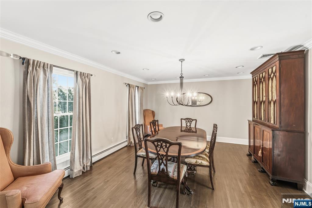 27 Pine Hill Road Old Tappan, NJ 07675 - Photo 7 of 50 a view of a dining room with furniture window and wooden floor