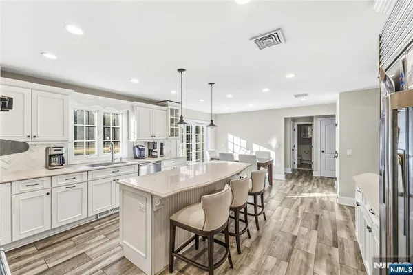 a very nice looking kitchen with a large counter space