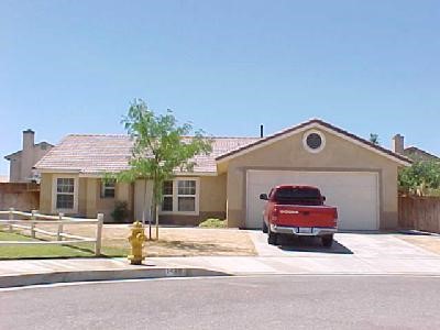 a car parked in front of a house