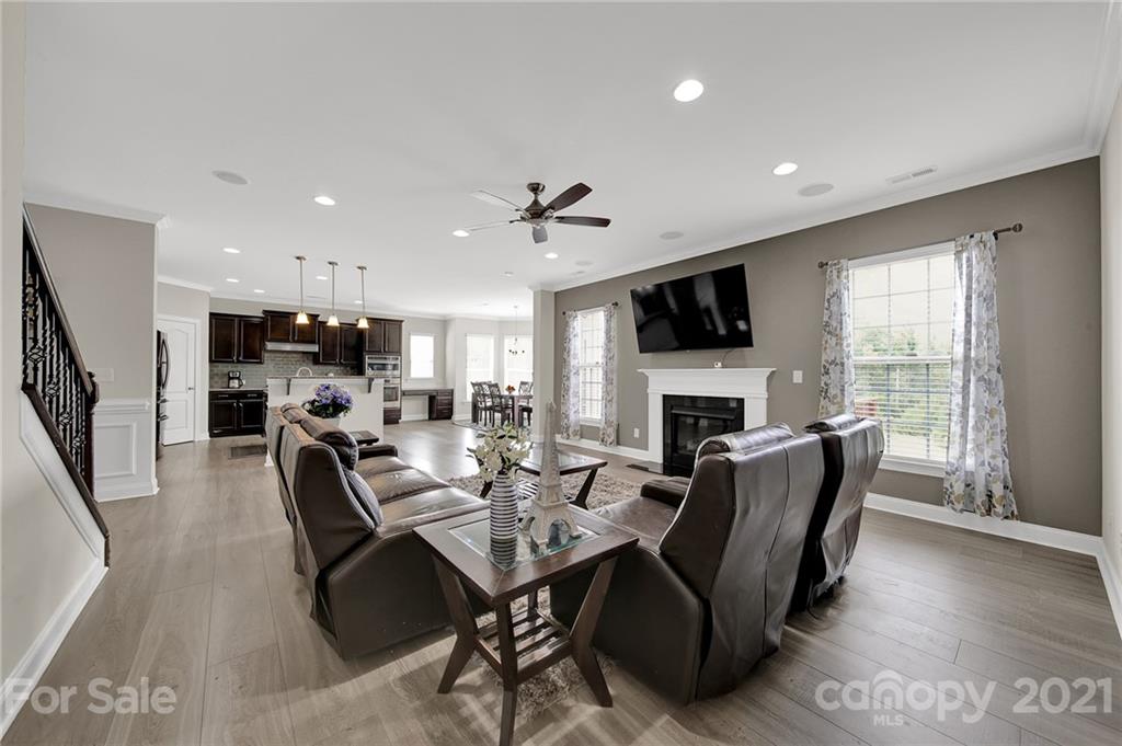 813 Bridge View Court Fort Mill, SC 29708 - Photo 19 of 42 a view of a dining room with furniture window and wooden floor