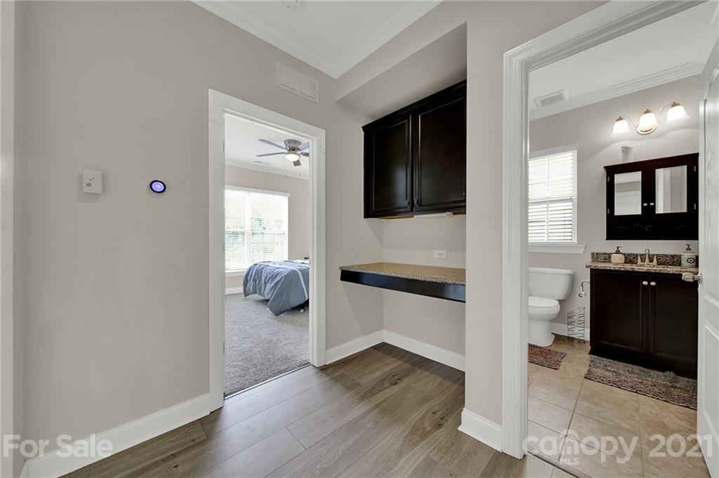 813 Bridge View Court Fort Mill, SC 29708 - Photo 20 of 42 a en suite bathroom with a granite countertop sink and a mirror